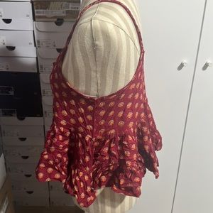 Patrons of peace peplum top